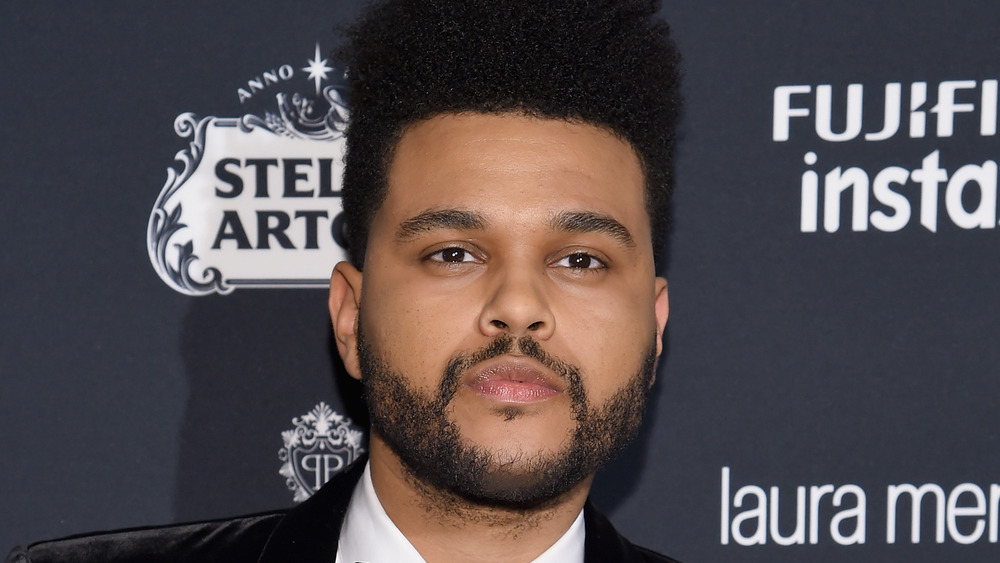The Weeknd with a suave expression