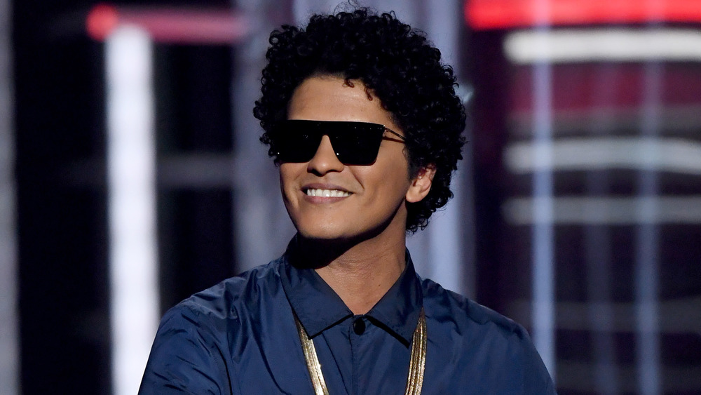 Bruno Mars wearing sunglasses at the Grammys
