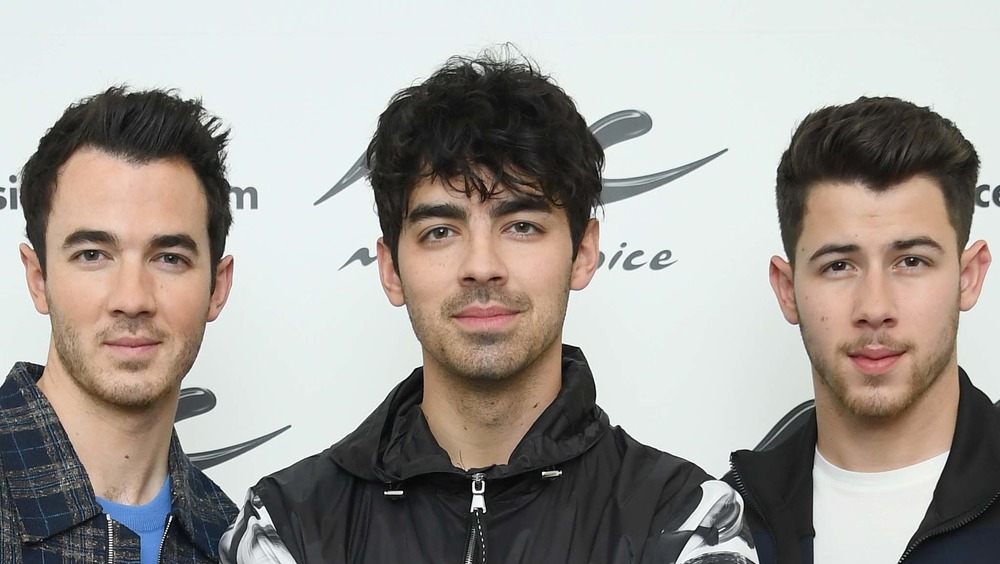 The Jonas Brothers smiling