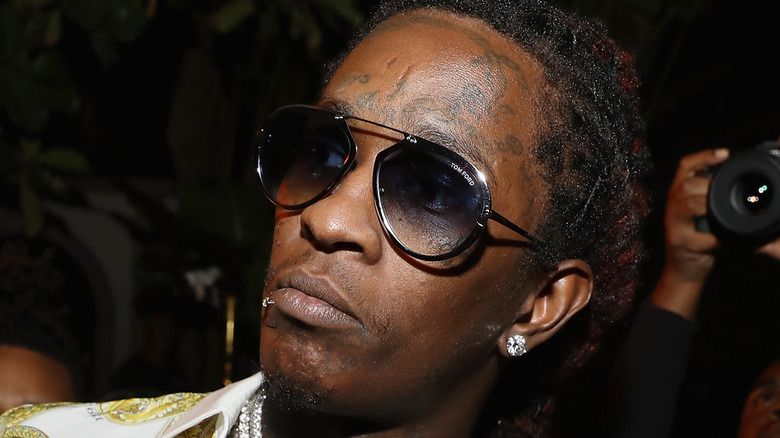 Young Thug wearing sunglasses