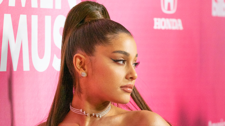 Ariana Grande posing with her head turned