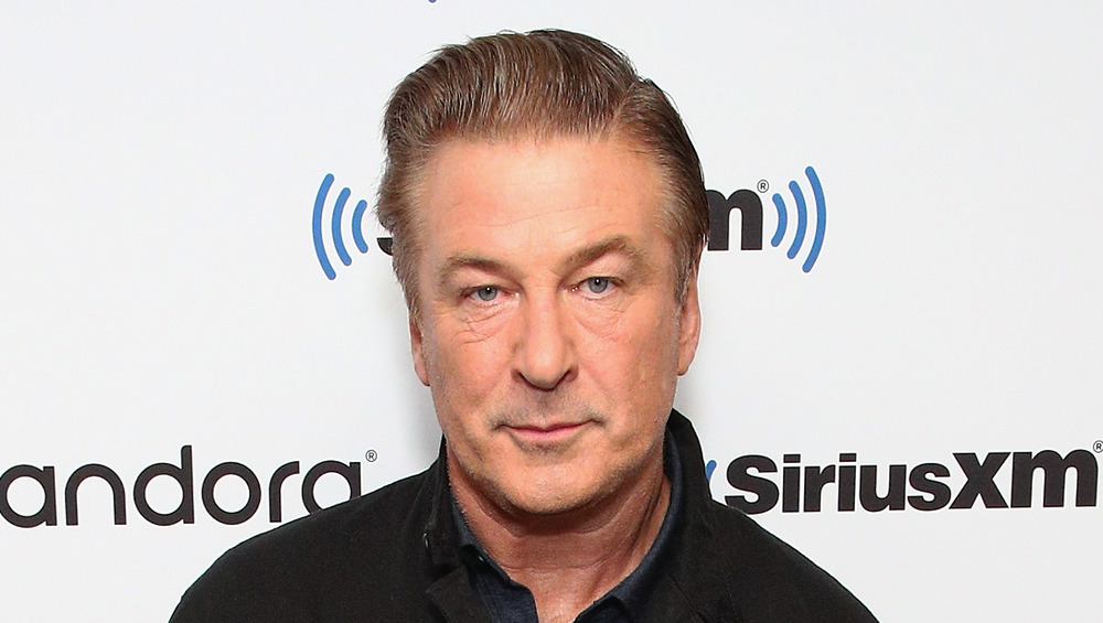 Alec Baldwin staring straight into the camera