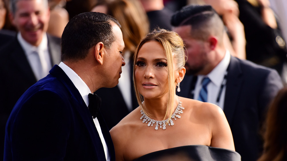 Alex Rodriguez talking to Jennifer Lopez on red carpet