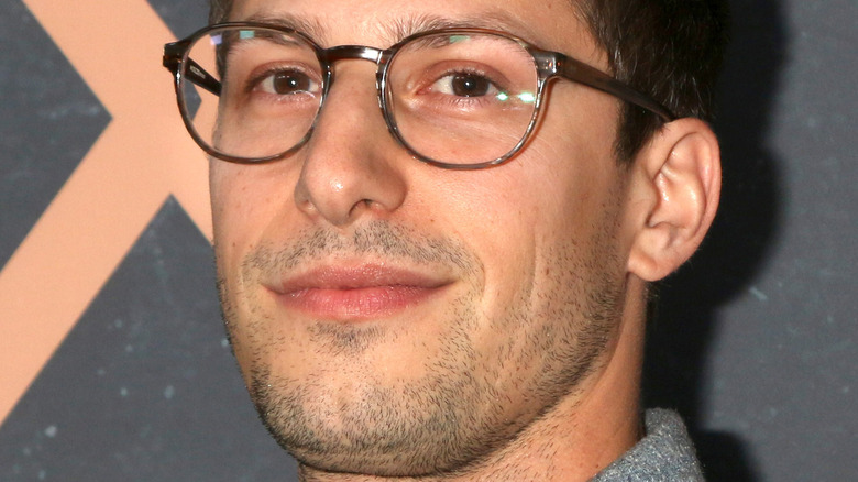 Andy Samberg wearing glasses