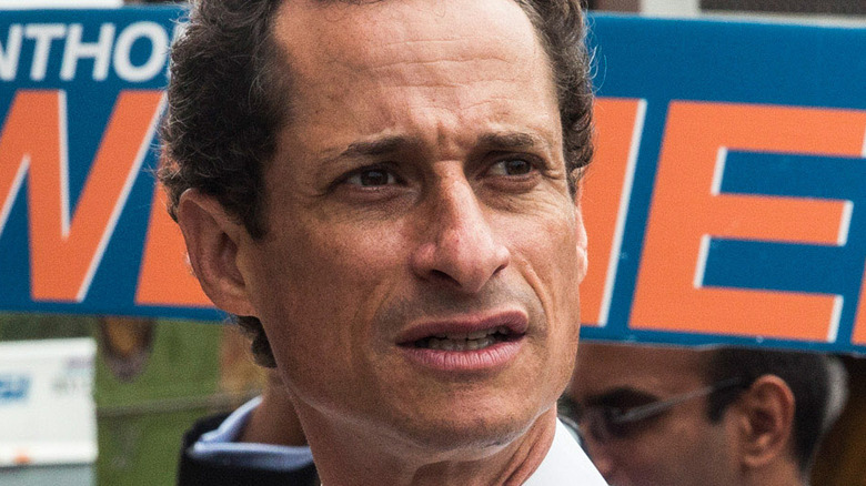 Anthony Weiner meets with people on a street corner In Harlem while campaigning in 