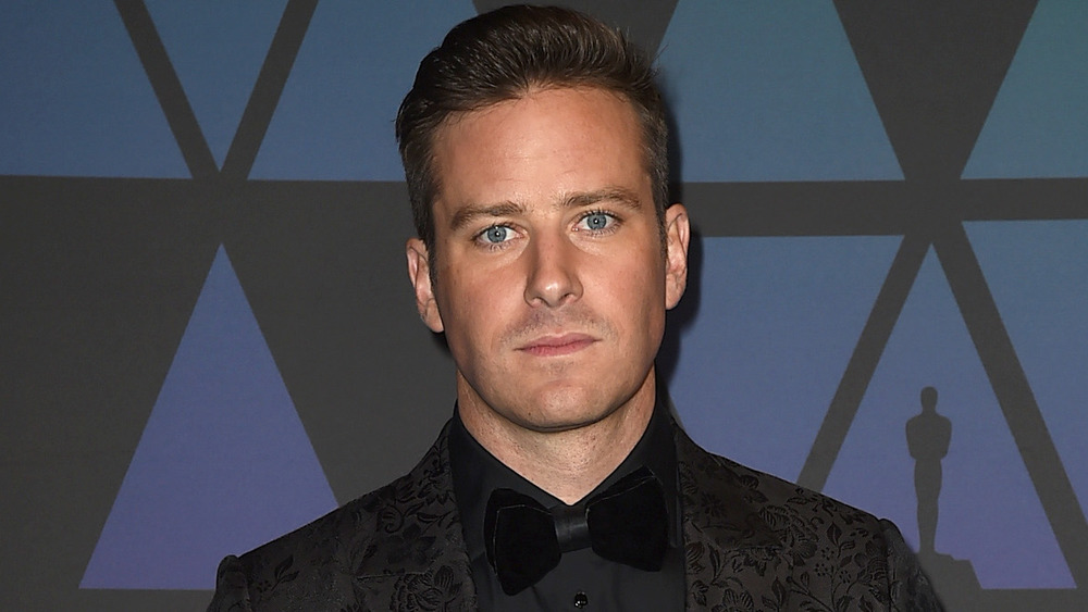 Armie Hammer staring