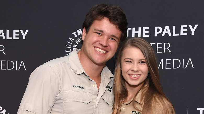 Chandler Powell and Bindi Irwin smiling