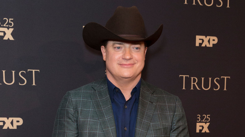 Brendan Fraser wearing a cowboy hat