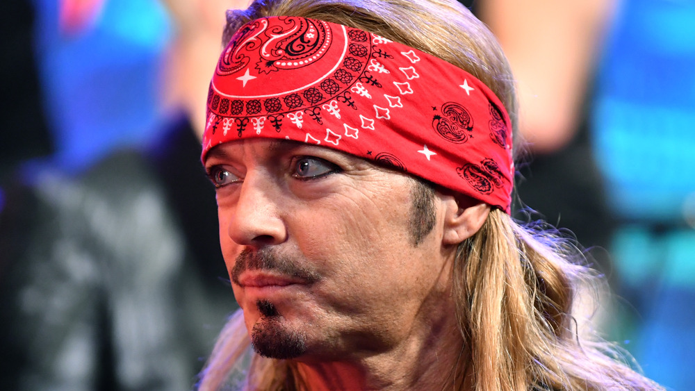 Bret Michaels wears a red bandana