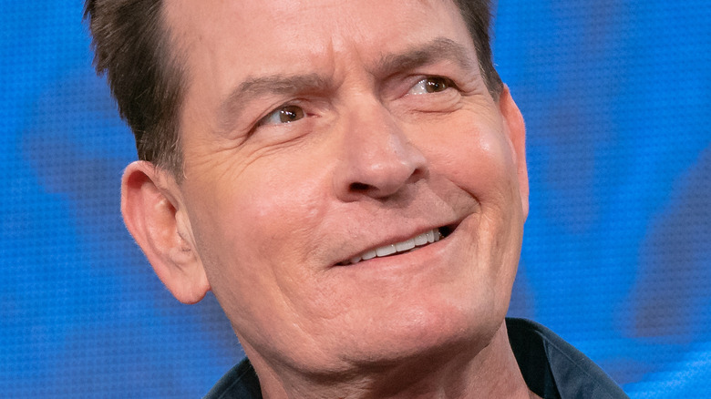 Charlie Sheen smiles at ComicCon