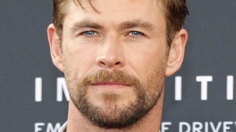 Chris Hemsworth posing on the red carpet