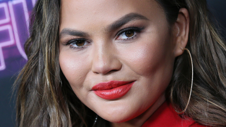 Chrissy Teigen with red lipstick