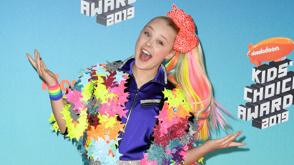 JoJo Siwa smiling on the red carpet 