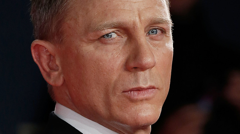 Daniel Craig poses in a tux and bowtie.