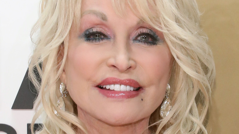 Dolly Parton smiling red carpet event