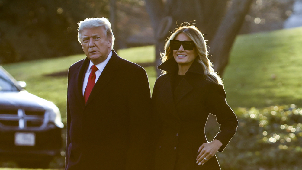 Donald and Melania Trump walking