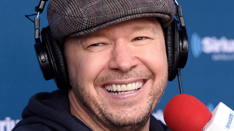 Donnie Wahlberg wear hat during Sirius XM interview