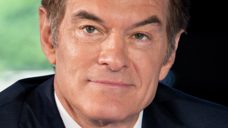 Dr. Mehmet Oz visiting "Extra"