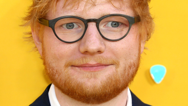 Ed Sheeran posing on the red carpet