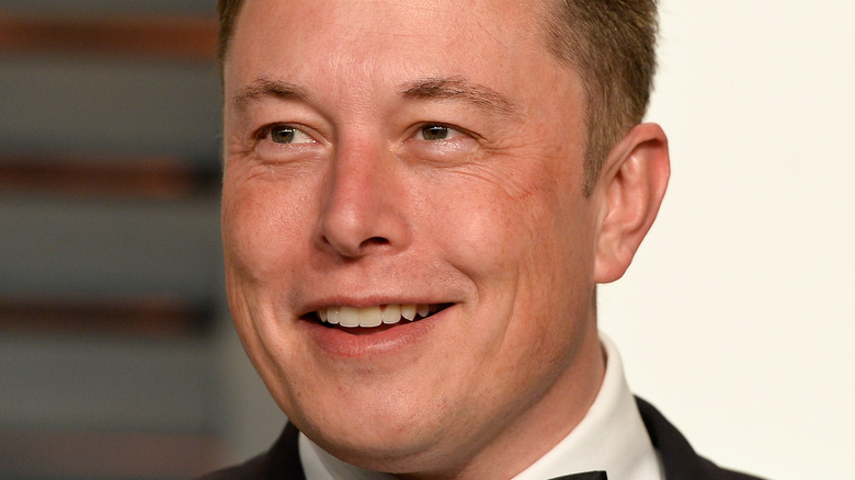 Elon Musk poses in a tux