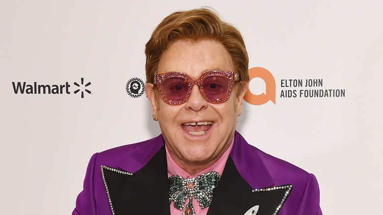 Elton John wearing glittery glasses