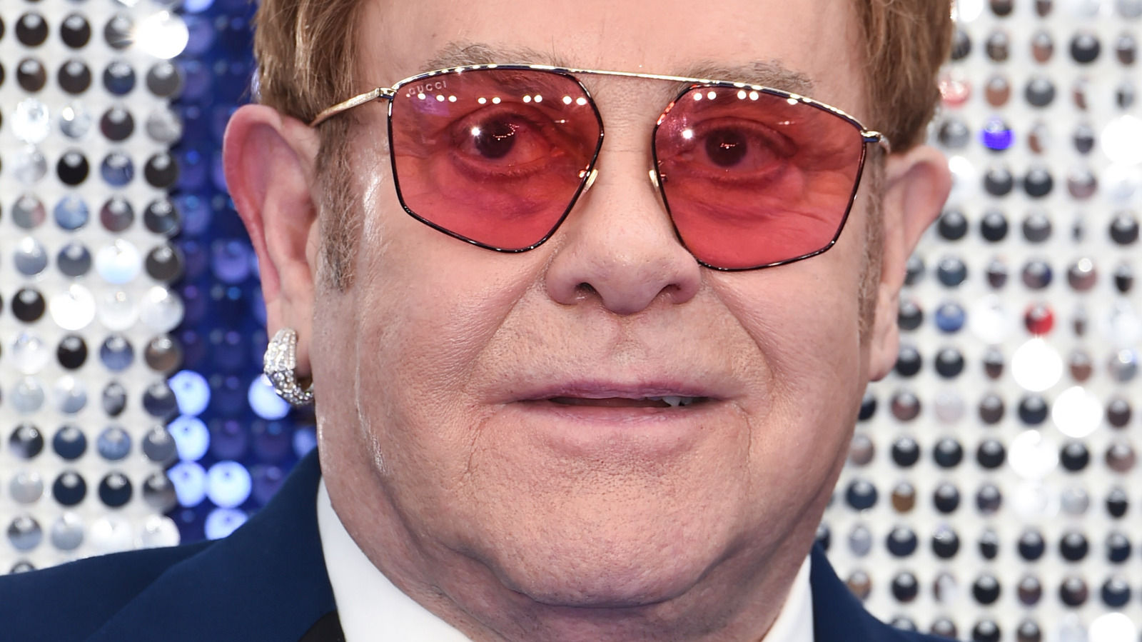 The Real Reason Elton John Wears Glasses
