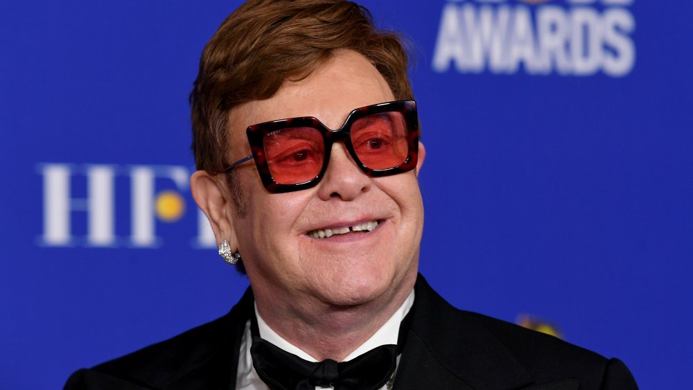 Elton John attends the 77th annual Golden Globes