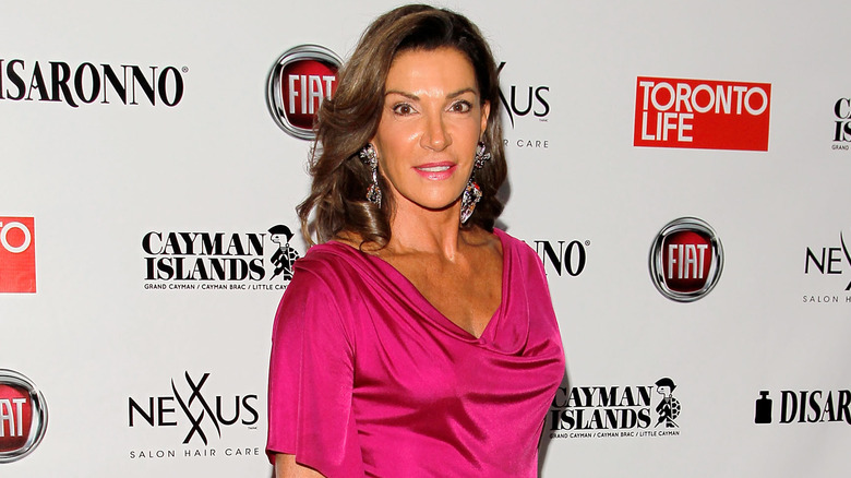 Hilary Farr smiling at red carpet event