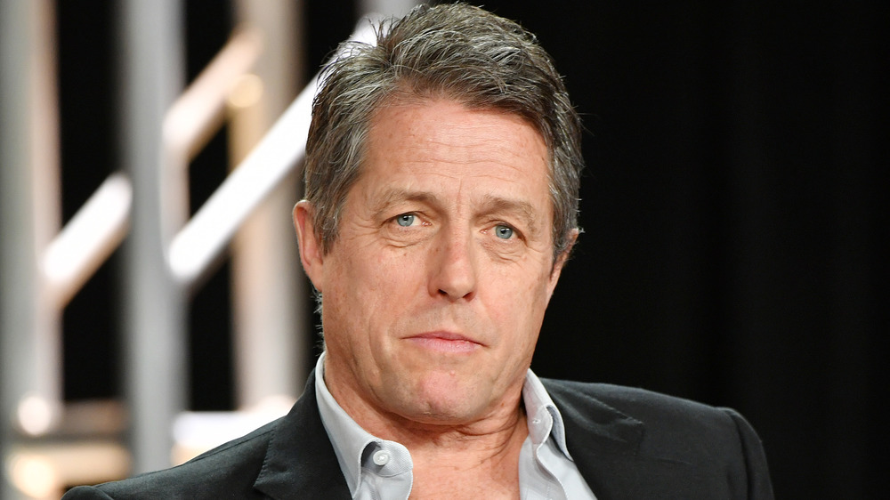 Hugh Grant staring into the camera