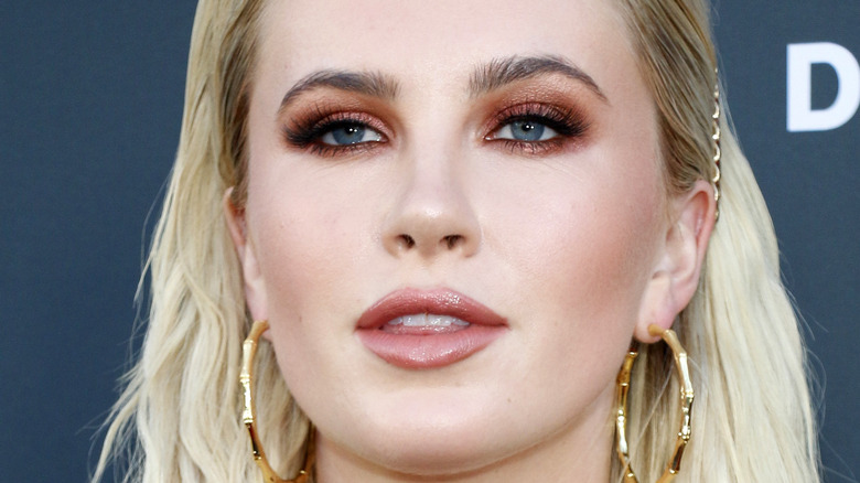 Ireland Baldwin posing on a 2019 red carpet