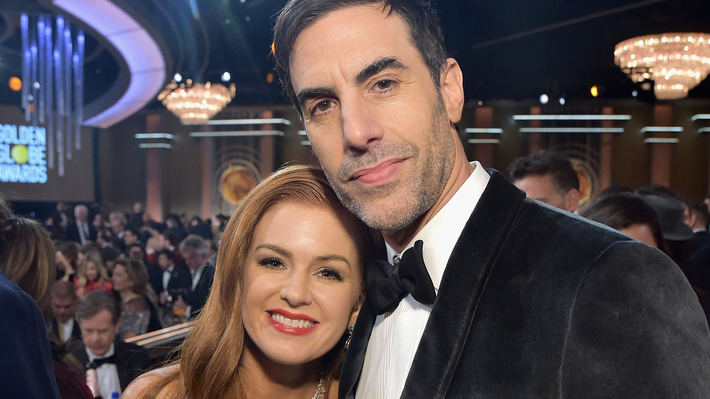 Isla Fisher and Sacha Baron Cohen smiling