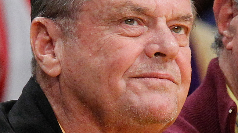 Jack Nicholson watching a basketball game.