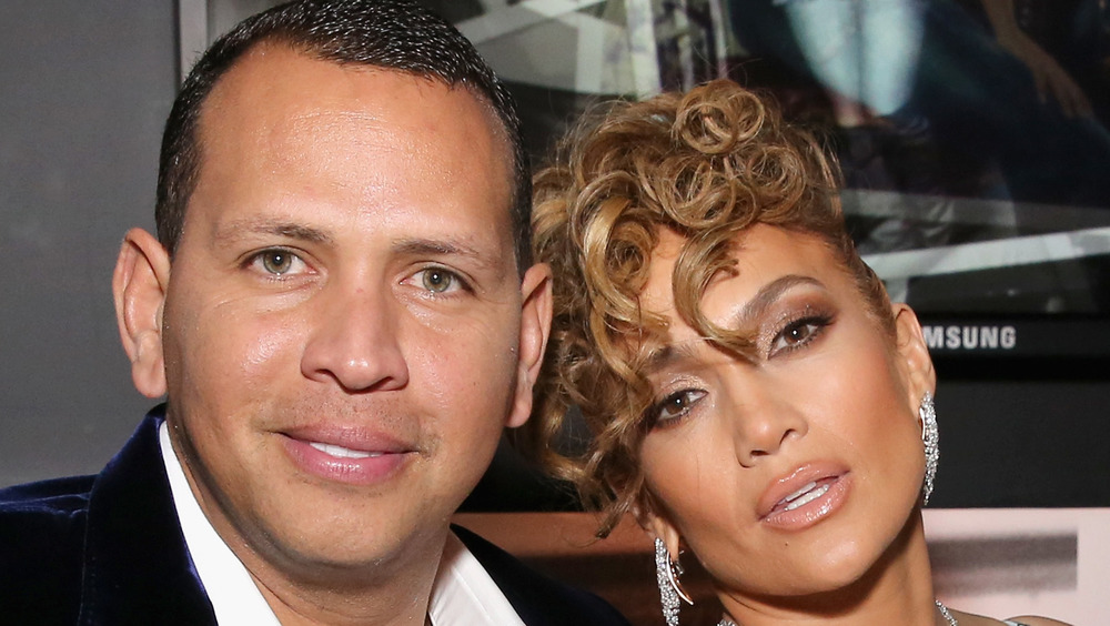 Alex Rodriguez and Jennifer Lopez posing