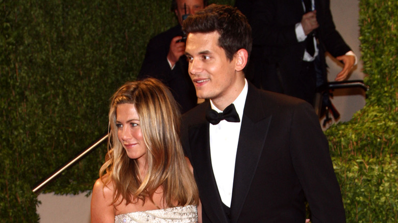 John Mayer and Jennifer Aniston on a red carpet