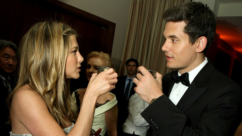 John Mayer and Jennifer Aniston having a drink