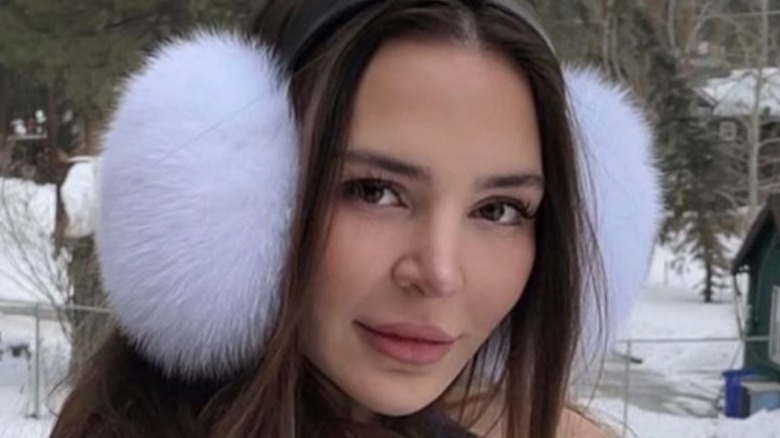 Anfisa with furry earmuffs