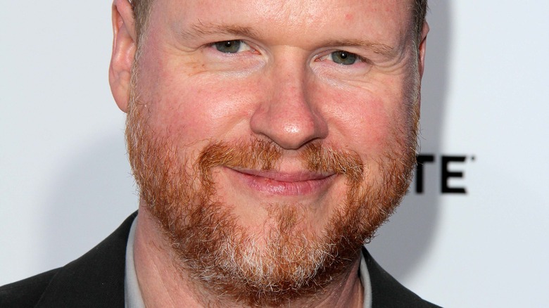 Joss Whedon smiling at the camera