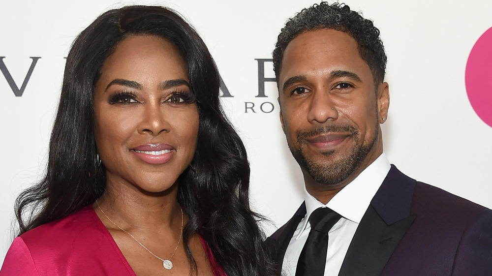Kenya Moore and Marc Daly smiling