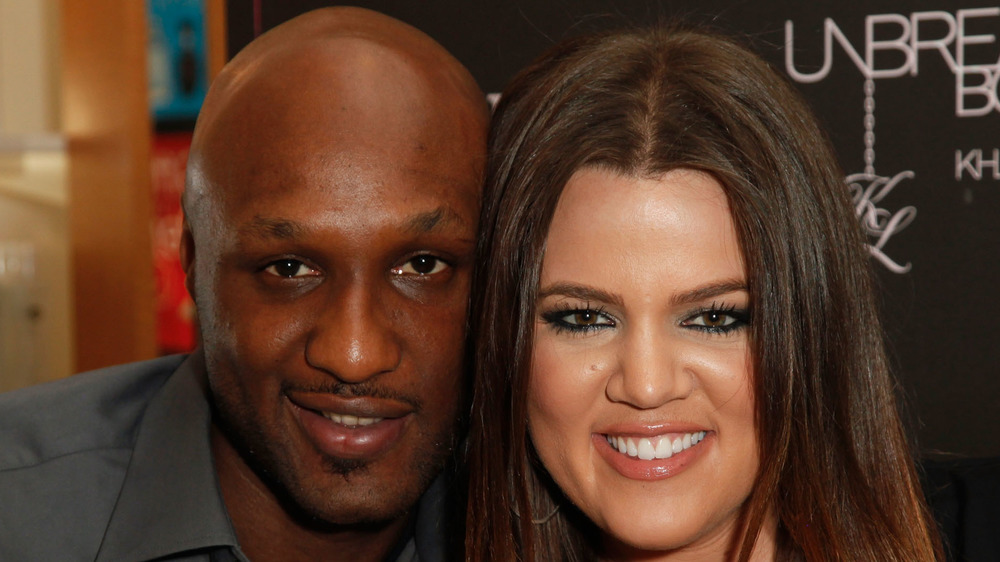 Khloe Kardashian and Lamar Odom pose for a picture