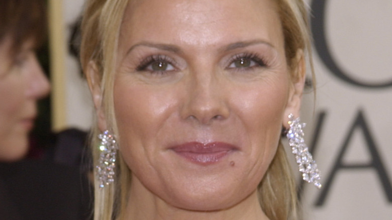 Kim Cattrall wearing diamond earrings