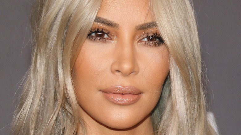 Kim Kardashian gives a smouldering look on the red carpet