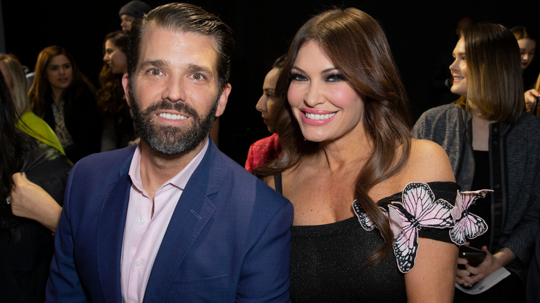 Donald Trump Jr. and Kimberly Guilfoyle smiling