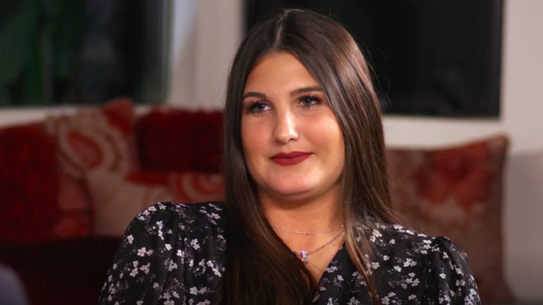 kortni gilson smiling in an interview