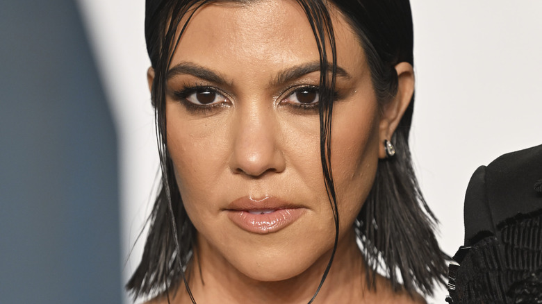 Kourtney Kardashian attends the 2022 Vanity Fair Oscar Party