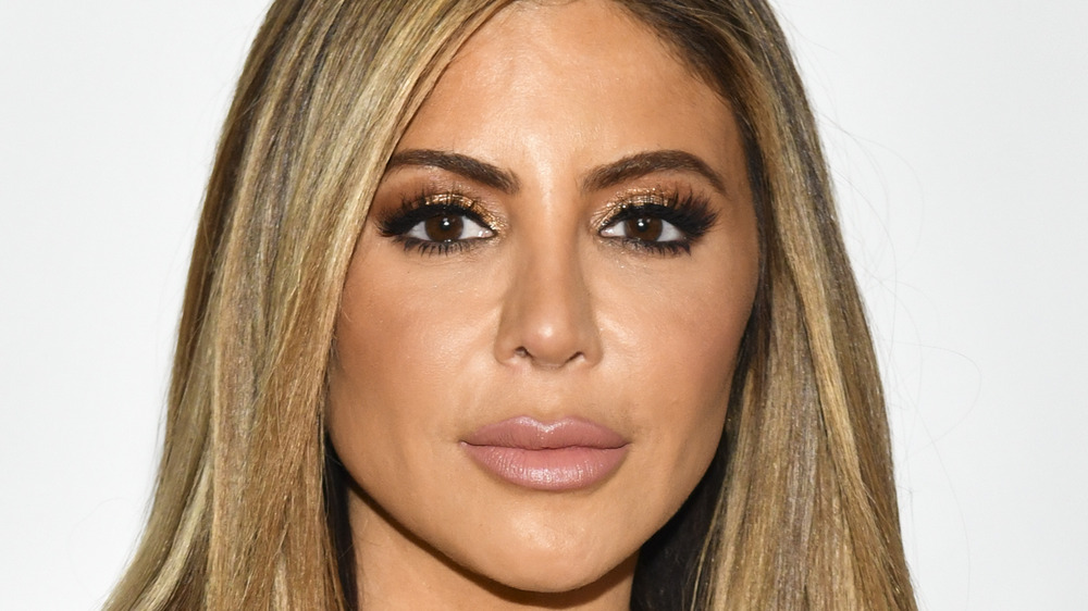 Larsa Pippen smiling slightly