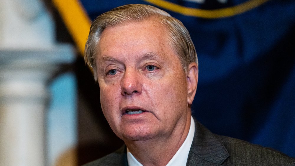 Lindsey Graham speaking while looking off to the side