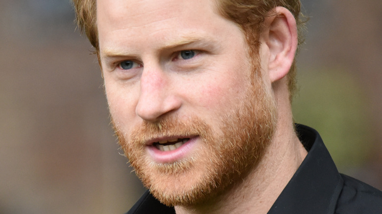 Prince Harry with a serious expression