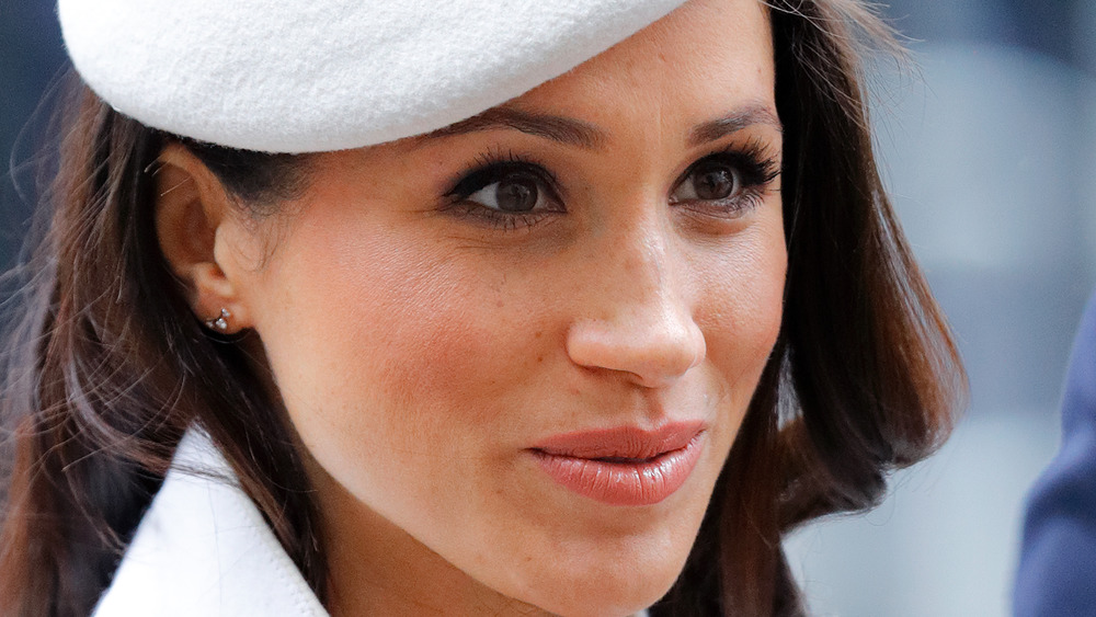 Meghan Markle wearing white hat