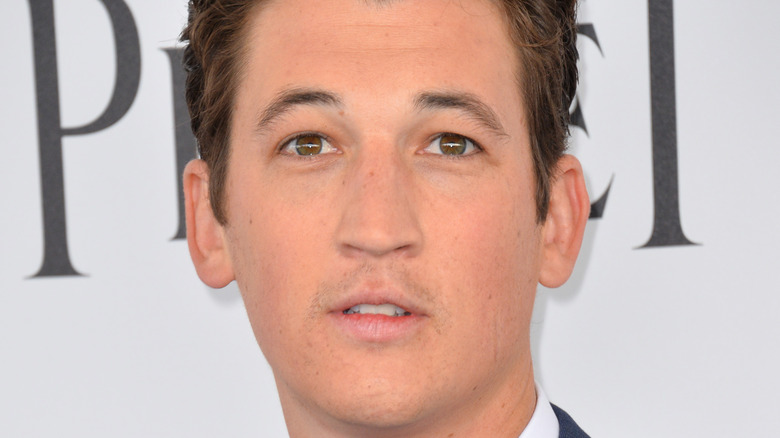 Miles Teller gives a perplexed look on the red carpet