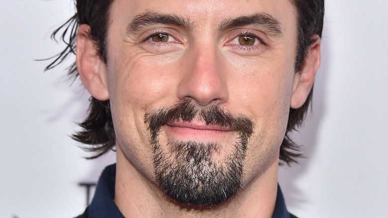 Milo Ventimiglia smirks 